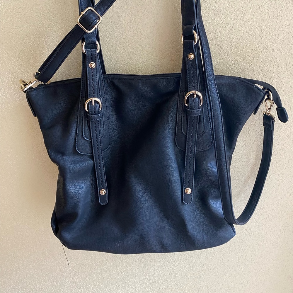 Black crossbody sachel/tote. Vegan leather. Soft, roomy, great detail.